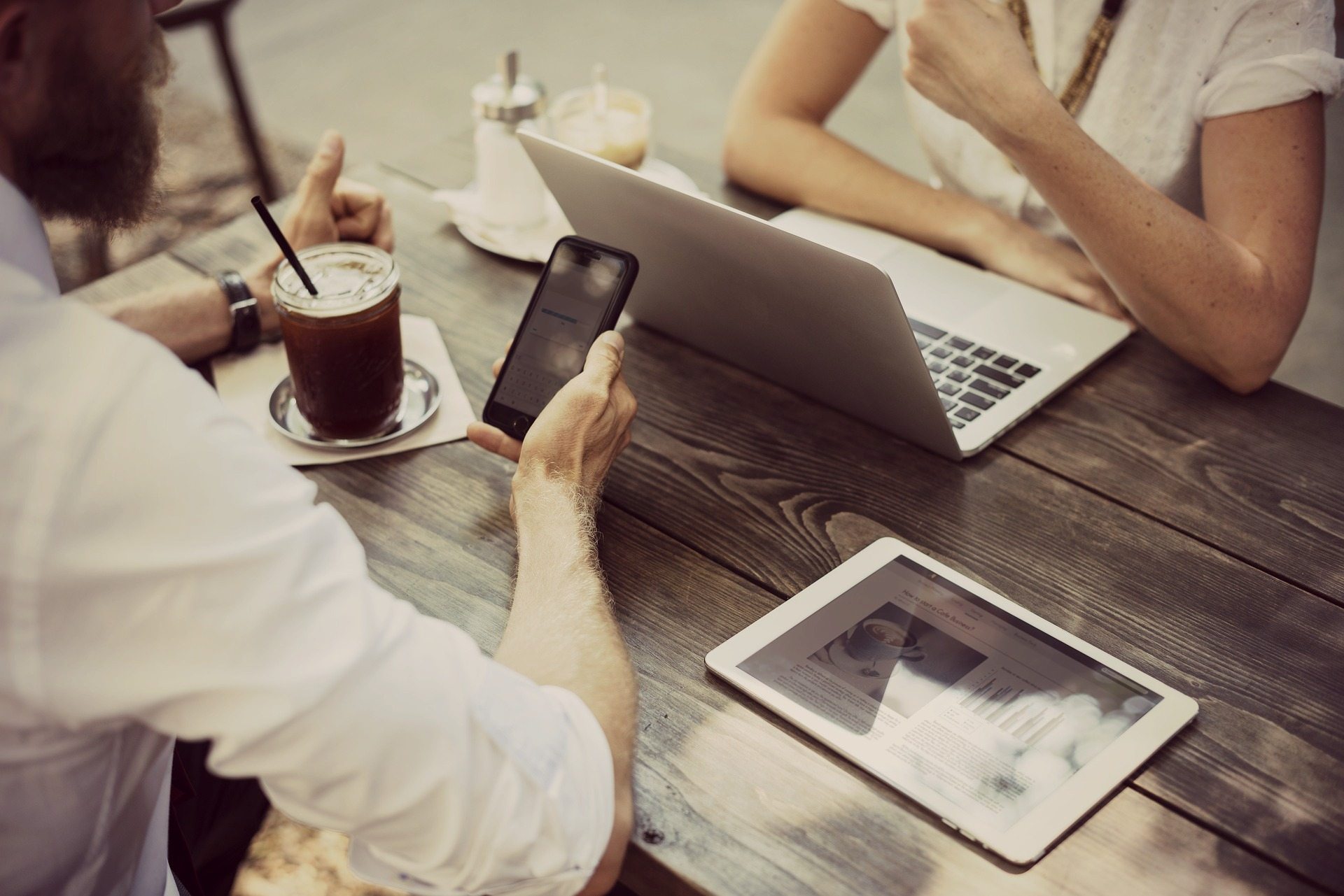 Two professionals networking from home